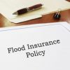 Flood,Insurance,Policy,On,An,Office,Desk