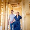 Fascinated,Couple,Walking,In,Their,New,House,Under,Construction,,Dreams