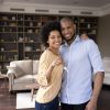 Happy,Homeowners,African,Couple,Showing,Keys,From,Their,New,Apartment
