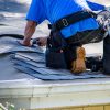 Repairing,The,Roof,Of,A,Home;,A,Worker,Replaces,Shingles