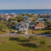 Intracoastal,Neighborhood,With,Single-family,Homes,At,Navarre,,Florida.,Panoramic,Aerial